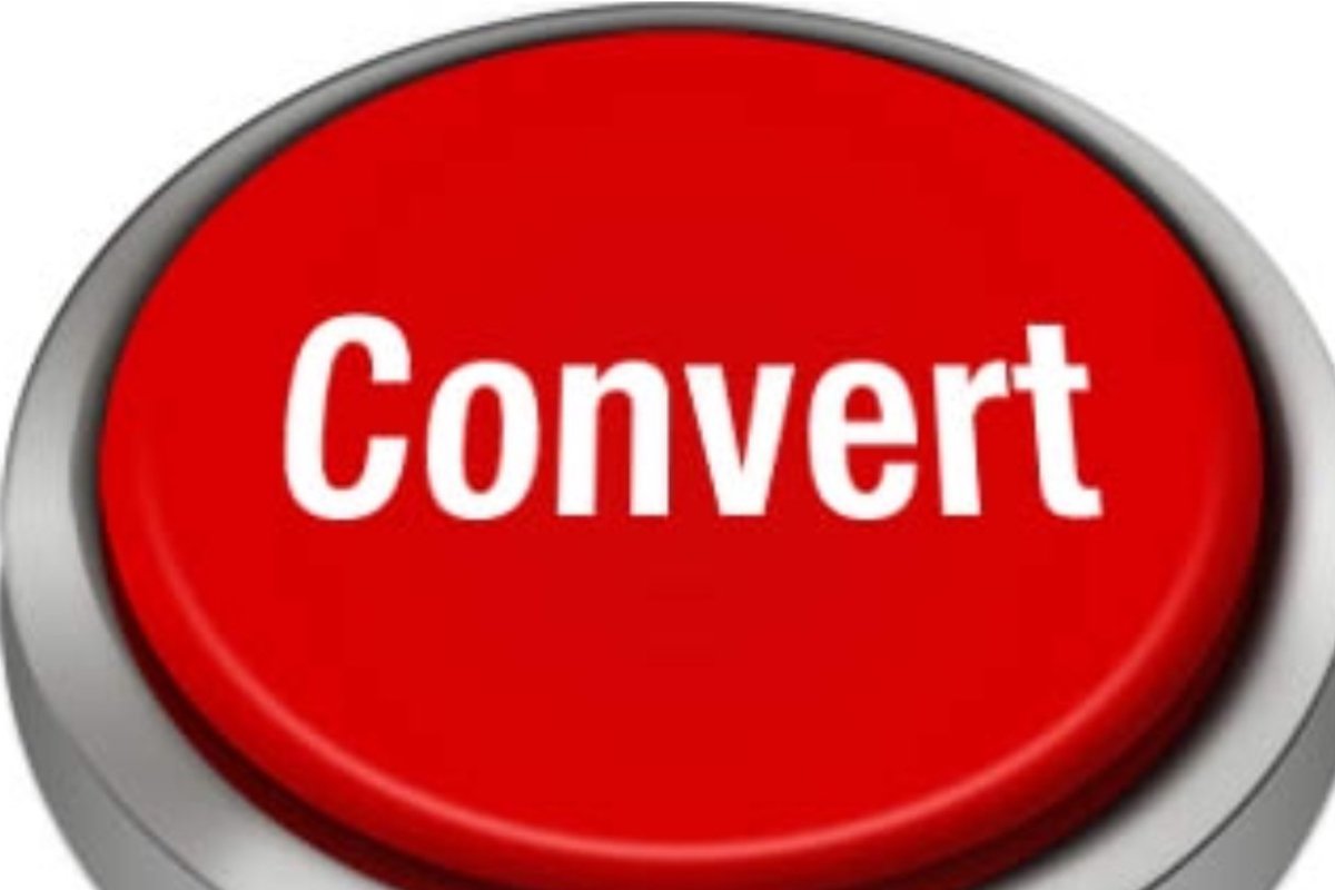 a big red button with the words convert