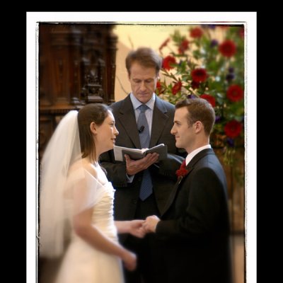 photograph of a couple making their vows in church