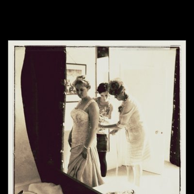 photograph of rachel proctor getting dressed for her wedding